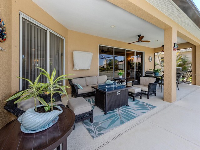 view of patio / terrace featuring an outdoor hangout area and a ceiling fan