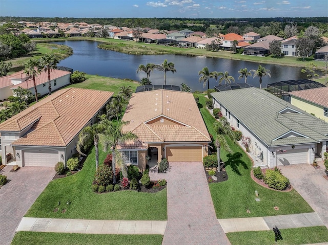 aerial view featuring a water view and a residential view