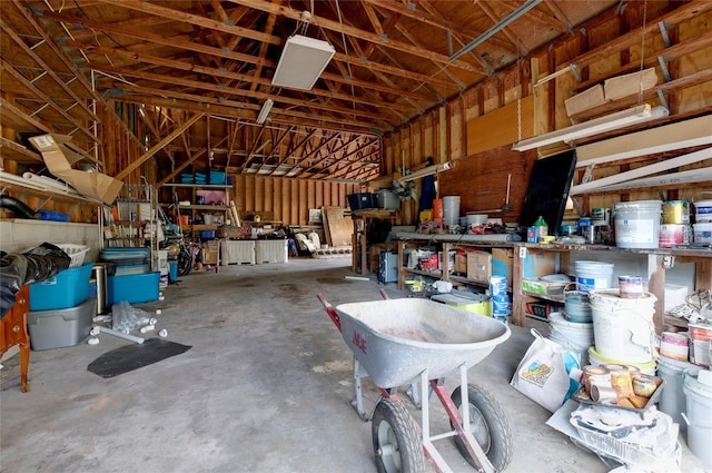 garage with a workshop area