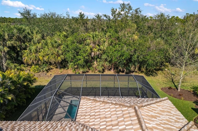 view of pool featuring a lanai