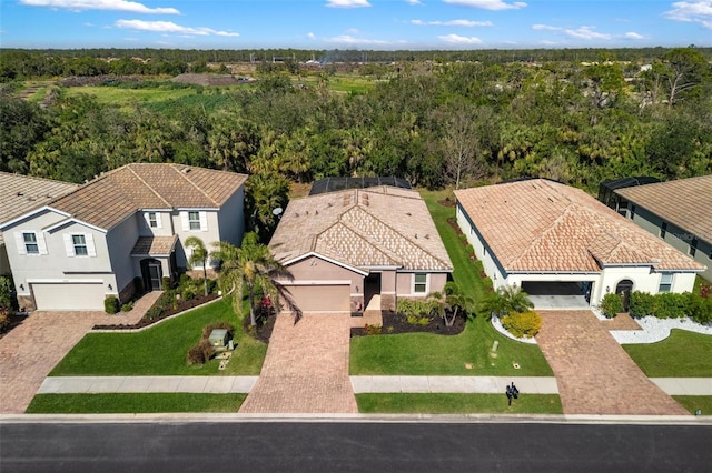 birds eye view of property with a residential view