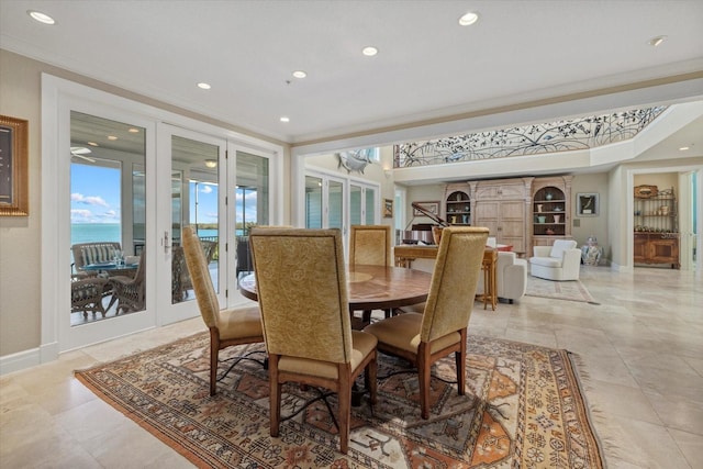 dining space featuring ornamental molding, recessed lighting, and baseboards