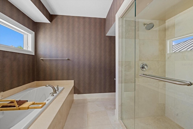 full bath featuring a stall shower, a bath, and wallpapered walls