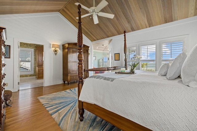 bedroom with high vaulted ceiling, wooden ceiling, ceiling fan, and wood finished floors