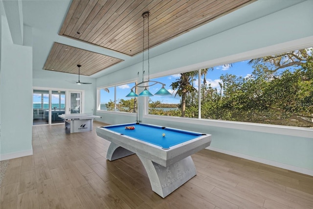 recreation room with a ceiling fan, billiards, baseboards, and wood finished floors