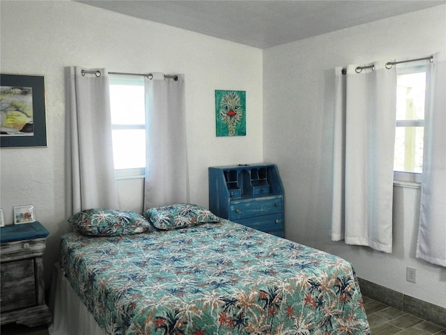 231 Redwood Rd, Venice, FL 34293 - bedroom featuring baseboards and wood finished floors