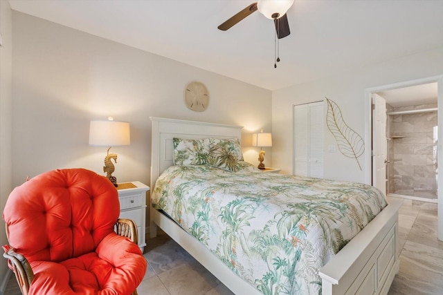 bedroom with a ceiling fan and ensuite bath