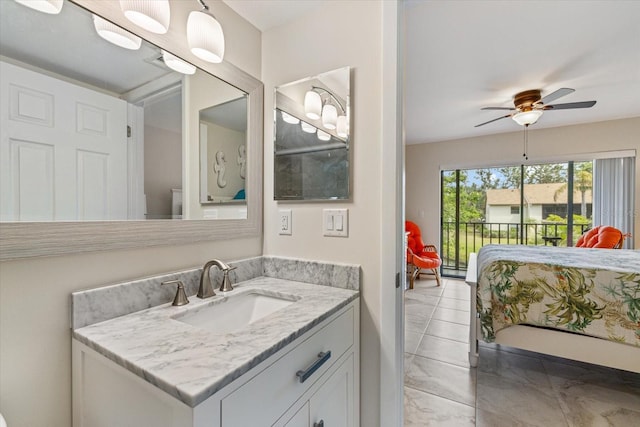 bathroom featuring ceiling fan and vanity