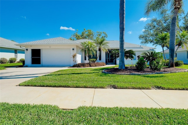 view of front of home with a garage, concrete driveway, a front yard, and stucco siding