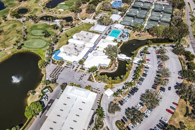 aerial view featuring a water view and golf course view