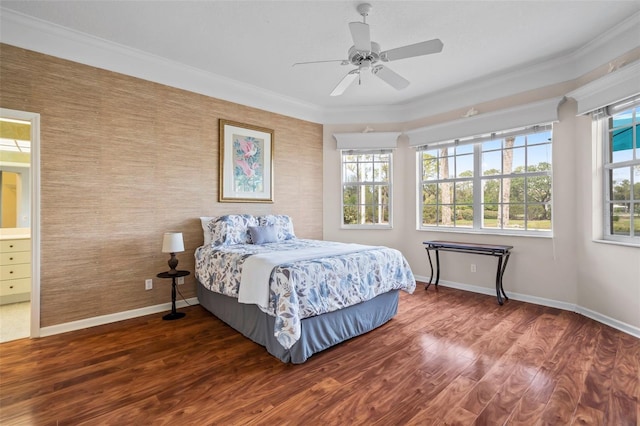 bedroom with baseboards, ornamental molding, ceiling fan, and wood finished floors