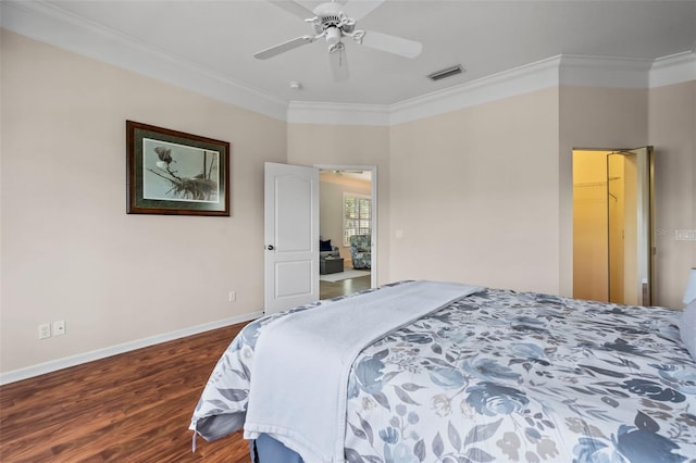 bedroom featuring baseboards, visible vents, a ceiling fan, ornamental molding, and wood finished floors