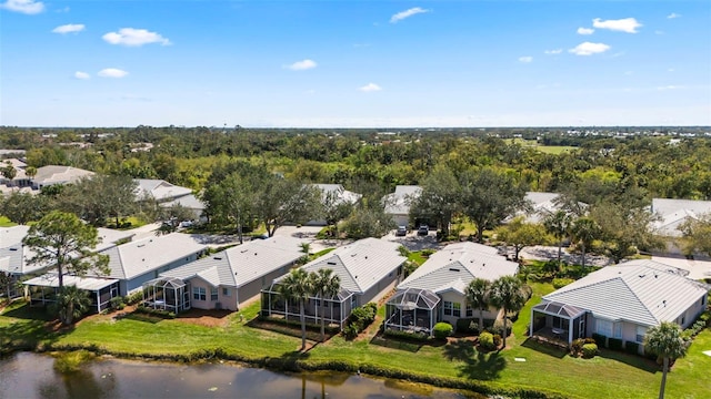 aerial view with a residential view and a water view