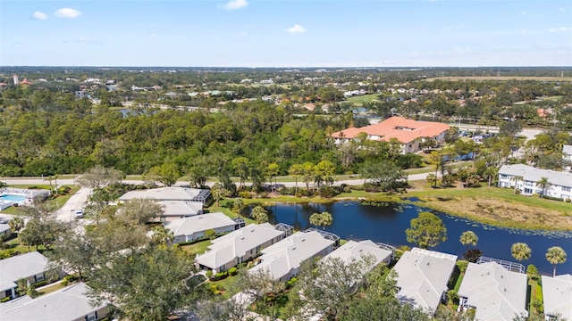 aerial view featuring a residential view and a water view