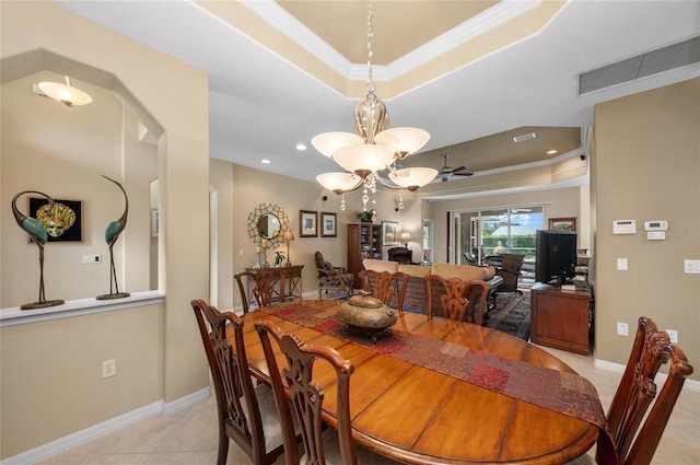 dining space with light tile patterned floors, baseboards, visible vents, a raised ceiling, and a notable chandelier