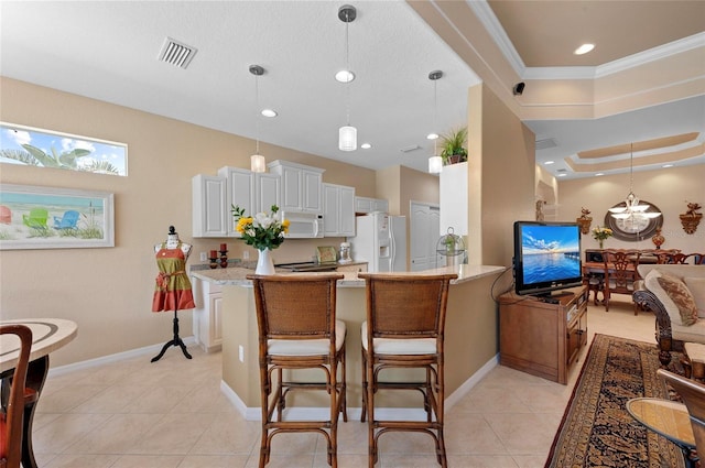 kitchen featuring white appliances, baseboards, light tile patterned floors, and visible vents