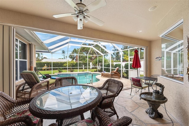 exterior space featuring a ceiling fan