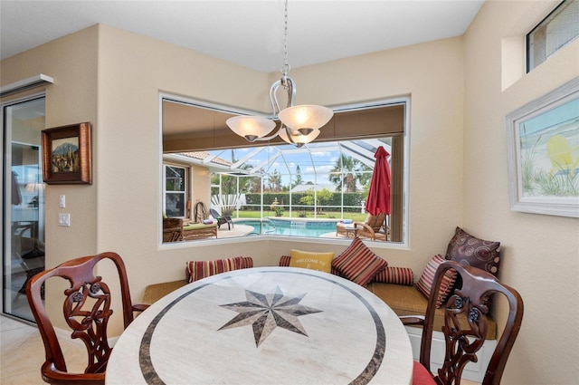 dining room with a sunroom