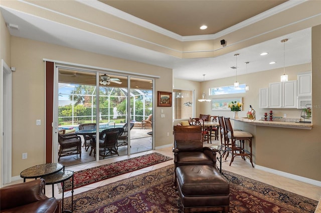 living area with a ceiling fan, recessed lighting, baseboards, and light tile patterned floors