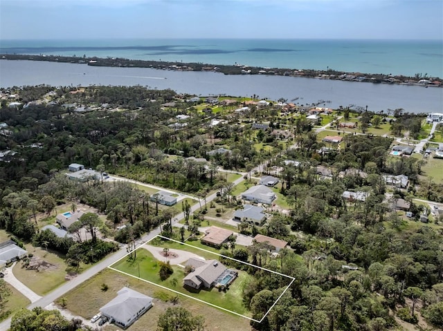 bird's eye view with a water view