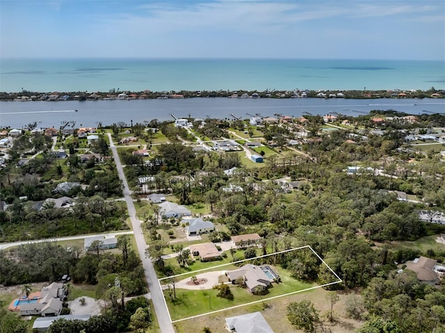 drone / aerial view with a water view