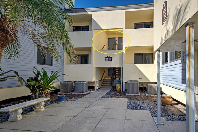 view of building exterior with cooling unit