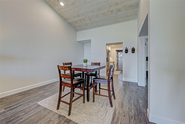 dining room with wood finished floors and baseboards