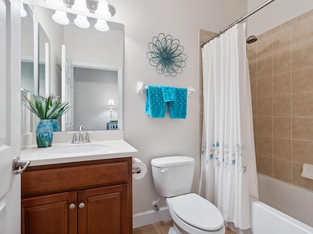 full bathroom with toilet, tile patterned floors, shower / tub combo with curtain, and vanity