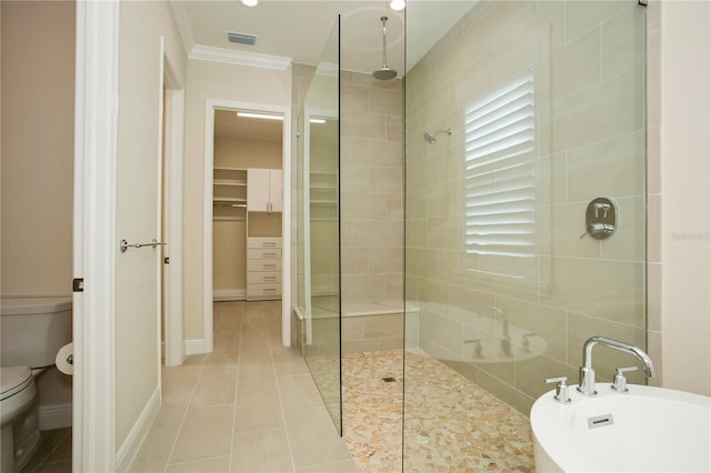 full bath with ornamental molding, walk in shower, toilet, and tile patterned floors