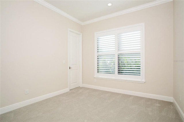 unfurnished room with recessed lighting, baseboards, crown molding, and light colored carpet