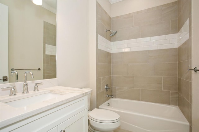 full bath featuring toilet, vanity, and bathing tub / shower combination