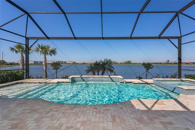 view of pool featuring a water view, a patio area, and a lanai