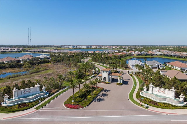 aerial view with a water view and a residential view