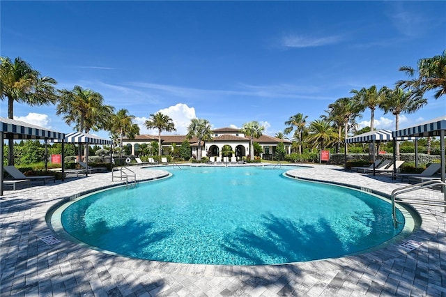 community pool featuring a patio area