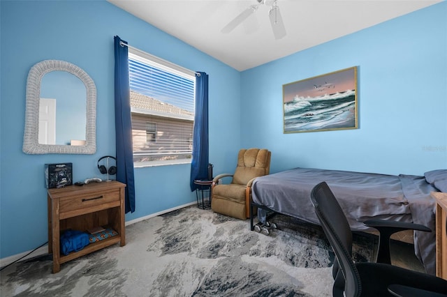 bedroom with a ceiling fan, carpet, and baseboards