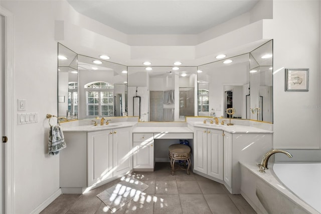 full bath featuring a bath, tile patterned flooring, and vanity