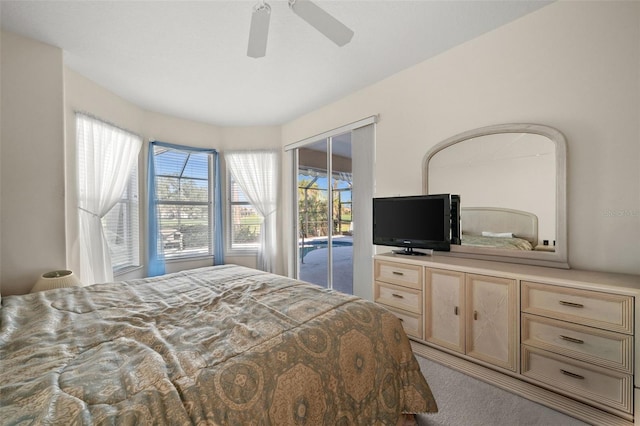 bedroom with carpet floors, access to outside, and a ceiling fan