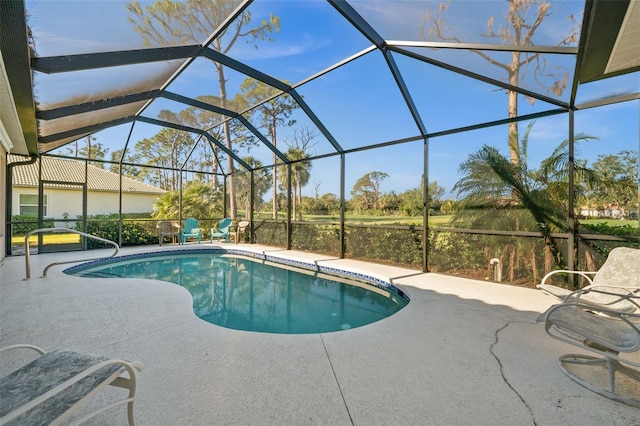 pool featuring a lanai and a patio area