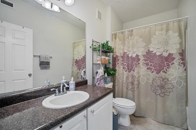 full bathroom featuring toilet, tile patterned flooring, visible vents, and vanity