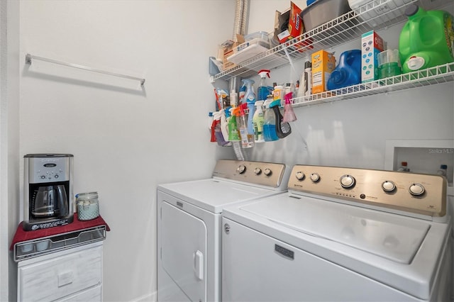 laundry area with laundry area and separate washer and dryer