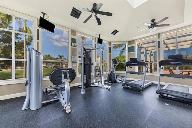 gym with plenty of natural light, baseboards, and a ceiling fan