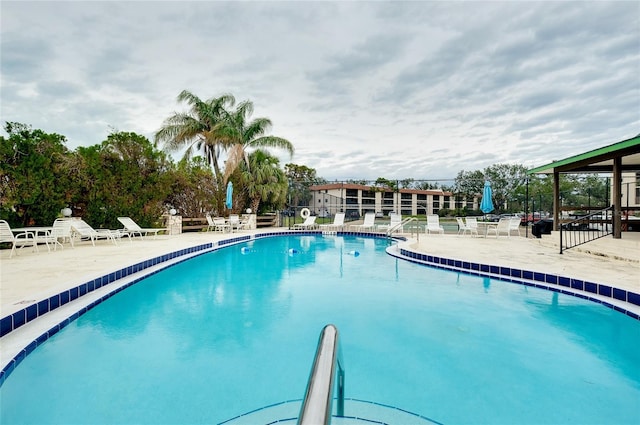 pool with a patio