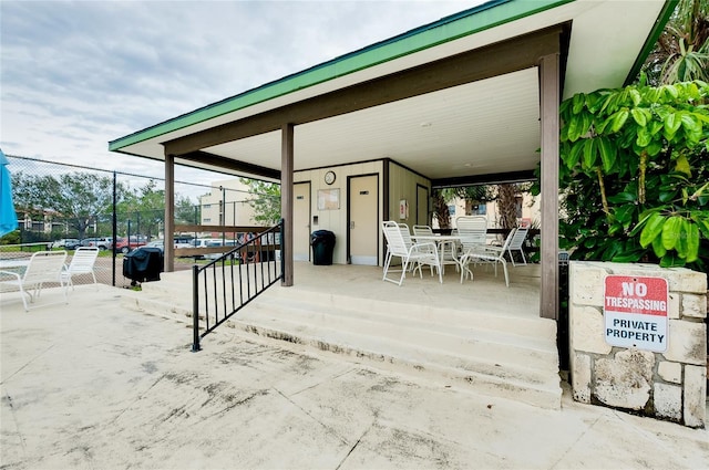 view of patio with fence