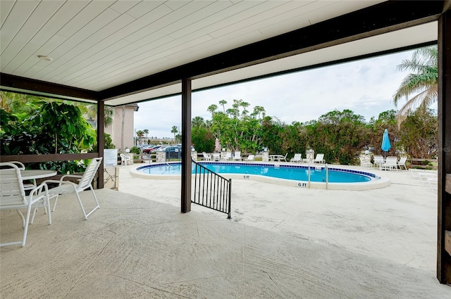 pool with a patio area