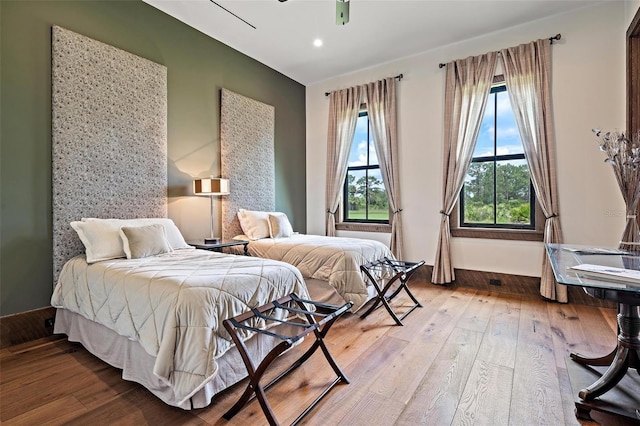 bedroom featuring wood-type flooring