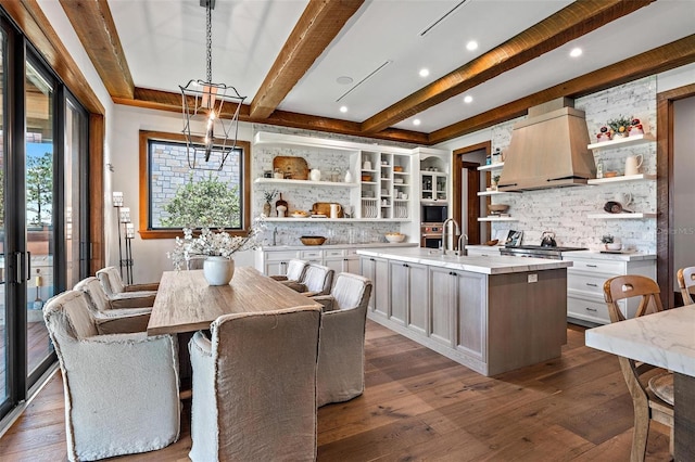 dining space with dark wood-type flooring, beamed ceiling, and recessed lighting