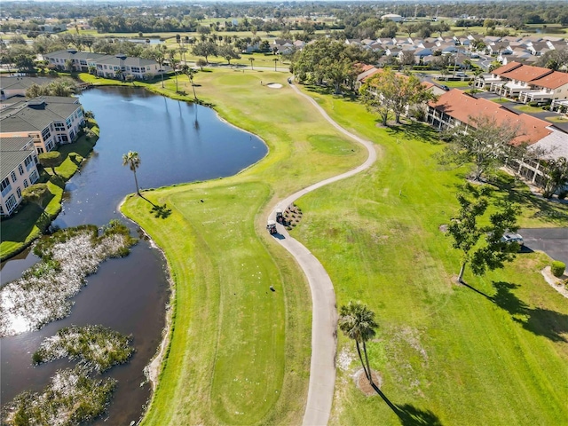 birds eye view of property with a residential view and a water view