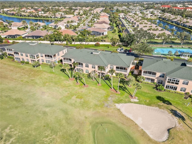 aerial view featuring a residential view and a water view