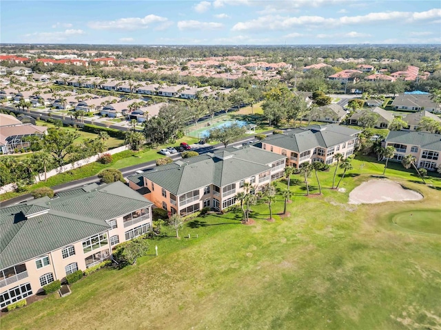 birds eye view of property with a residential view