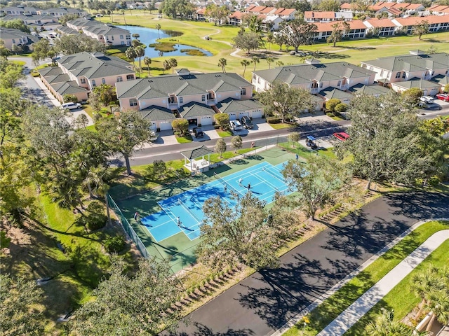 birds eye view of property with a residential view and a water view